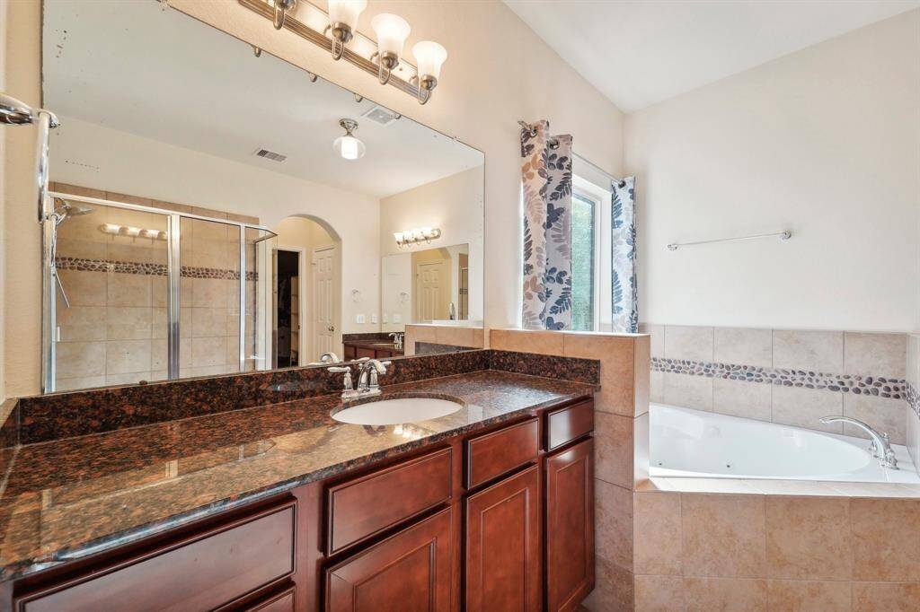 Dual vanities provide tons of space to get ready!