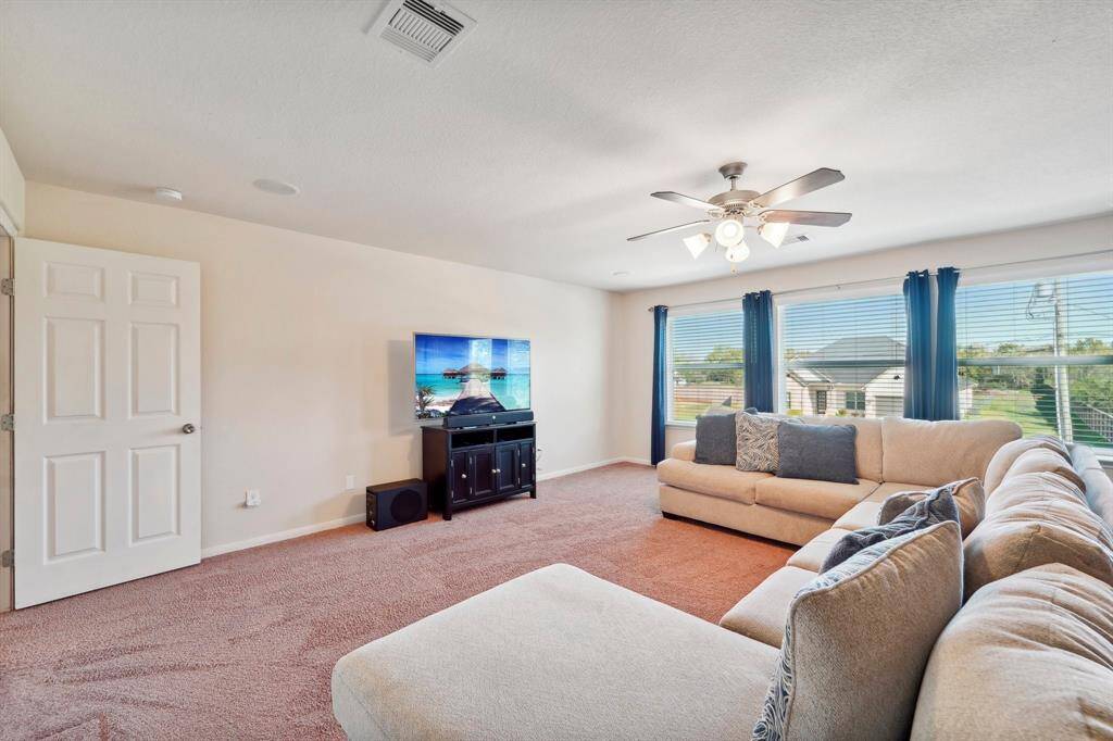 Another view of the upstairs gameroom with it's own door for privacy.