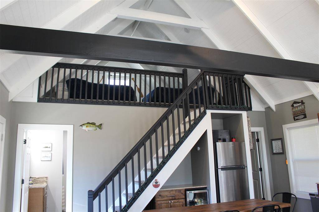 View From Fireplace looking up at spacious loft.