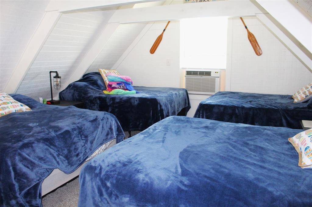 "A'mazing loft space with 4 double size beds. Sleep 8 with comfort easily.