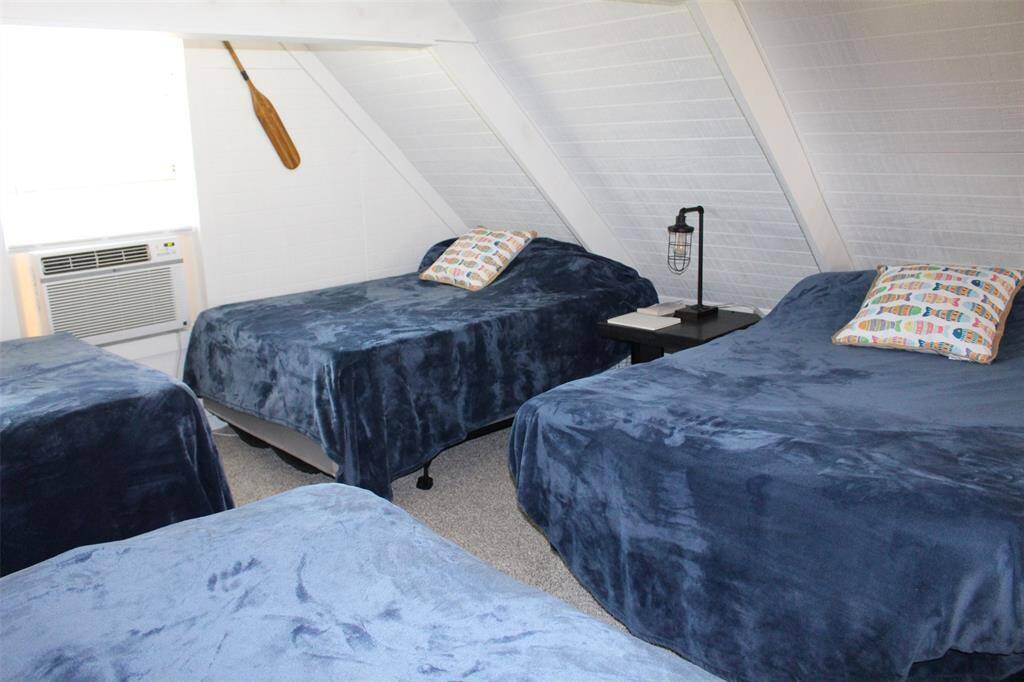 Remove two beds and have play area or even a game table. Great for puzzles and family game time.