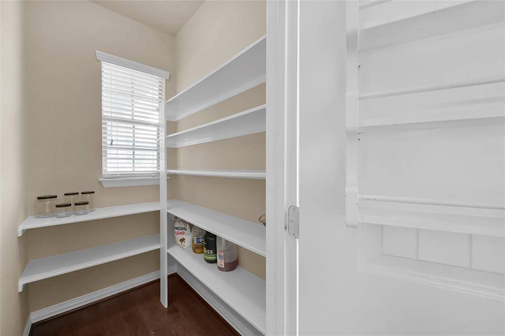 Expansive walk-in pantry, with built in spice rack! No storing your spices in cabinets anymore!!