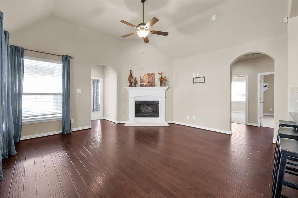 Beautiful living room with large windows keeps this room feeling airy and spacious