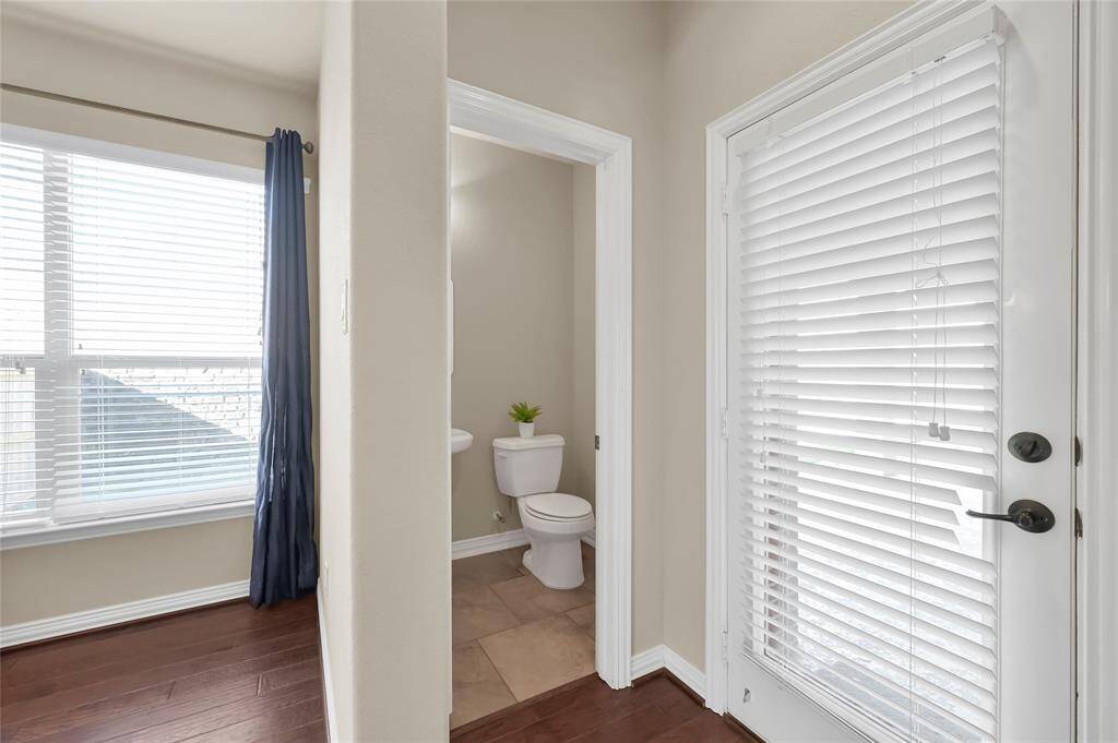 Half-bathroom off the dining/living area