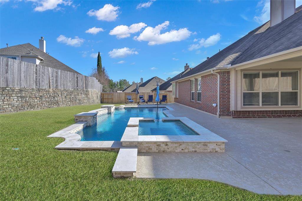 Pool installed summer of 2022. Chlorine. Drainage from retention wall is engineered to flow into street. No flooding issues with Harvey, Beryl, or last flood event that put River Plantation under water. Grading and French drains keep water away from the pool. Pool installers engineered water solutions to make sure. Side note: the higher houses are not allowed to have a pool in JR