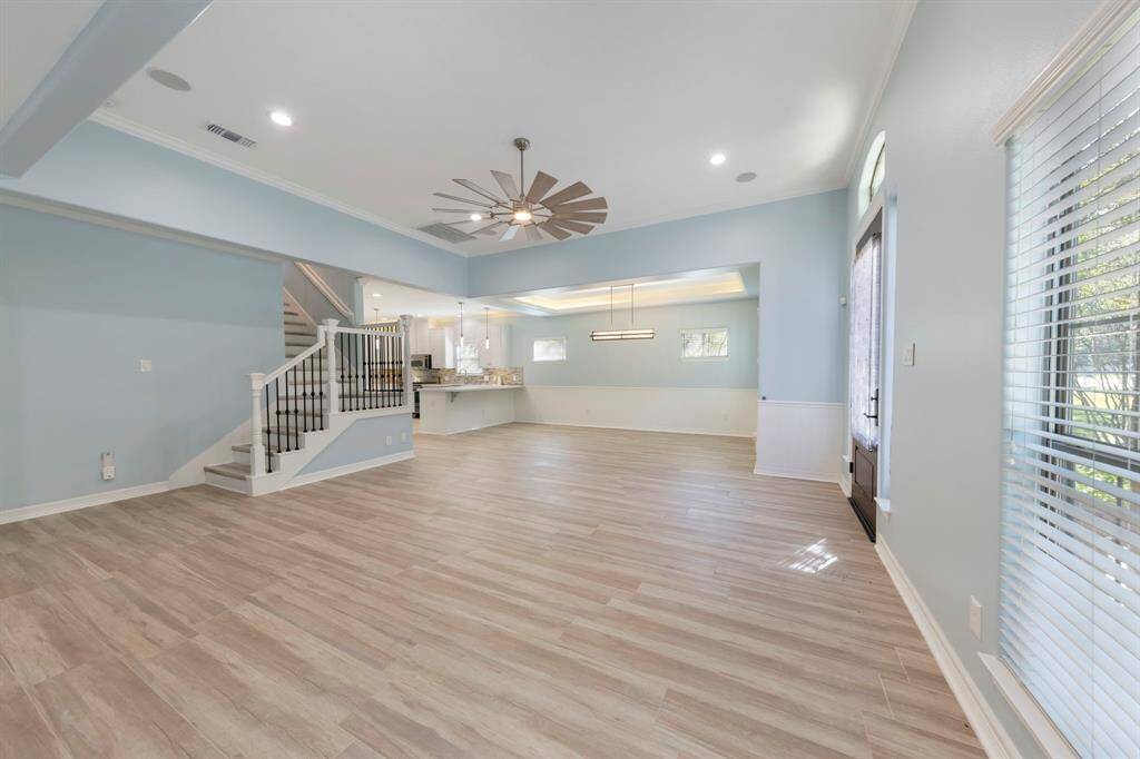 Wood-like tile spans the entire first floor, complemented by fresh paint throughout, giving the home a modern and refreshed feel while offering low maintenance living!