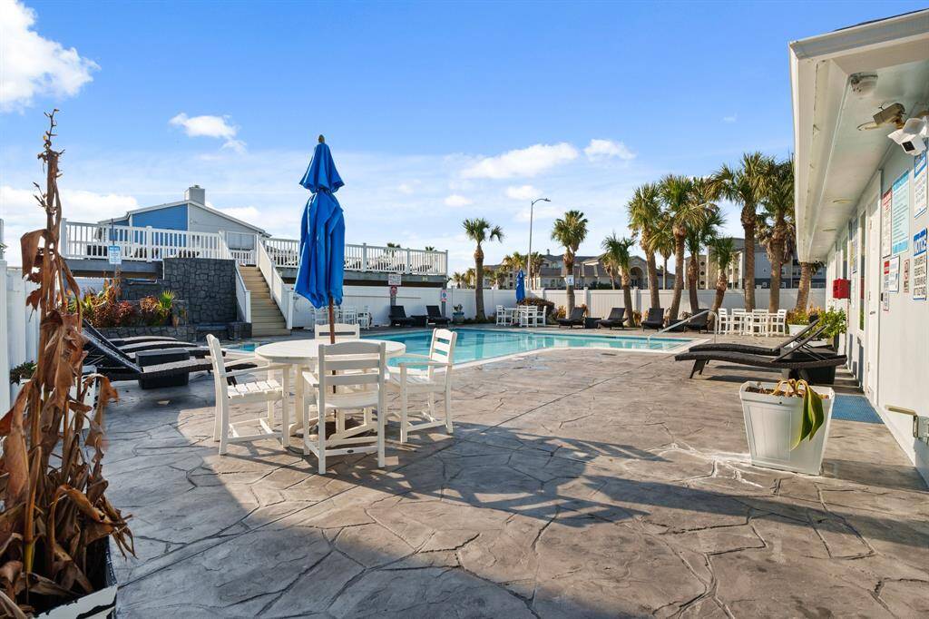 The at Palms at Cove View features this lovely pool area as well as an elevated deck - a perfect spot to enjoy the sun.