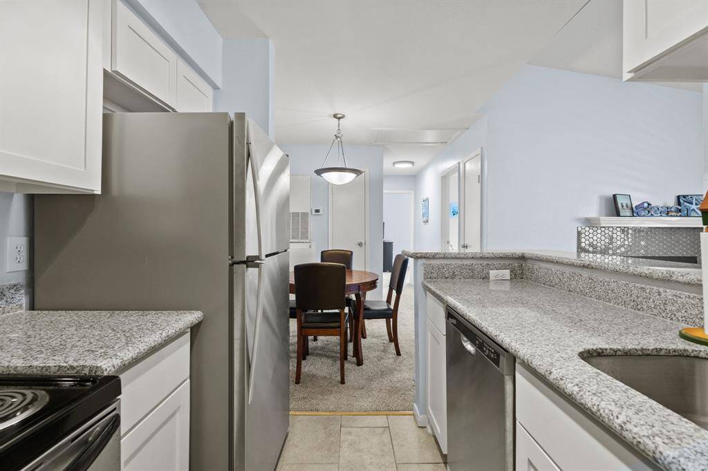 A view toward the dining area and the bedrooms beyond.