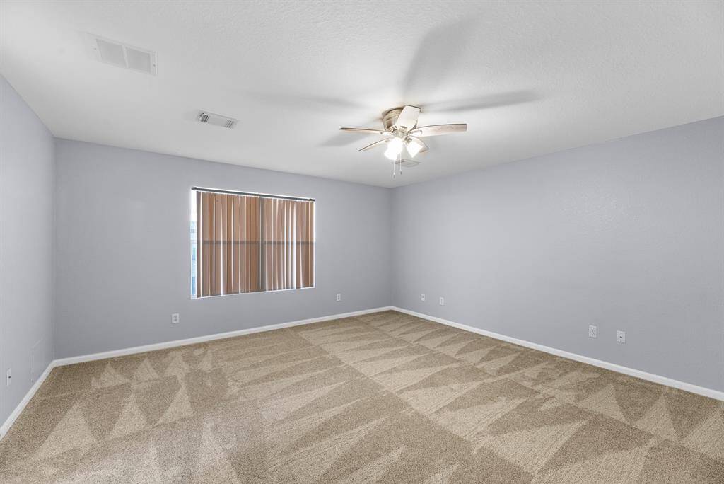 Primary Retreat is large enough for king-size furnishings. Plush NEW carpet & Freshly painted thru-out.