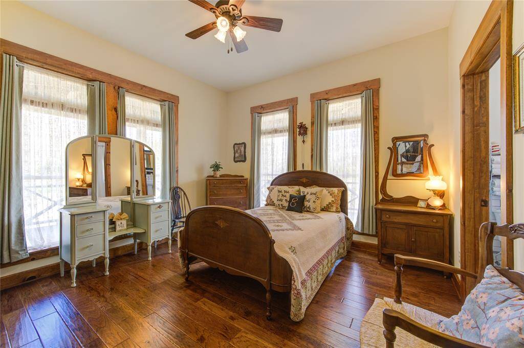 This first floor bedroom is fantastic for guest.  Numerous windows bring in lots of natural light. This bedroom has a walk-in closet and an en suite bathroom.
