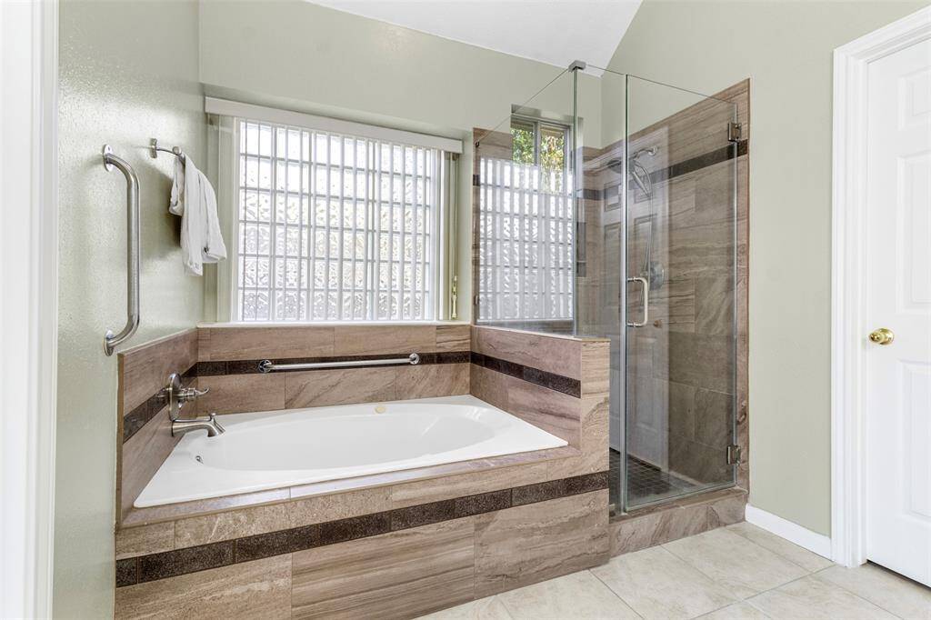 Primary Bathroom/ Shower and bathtub