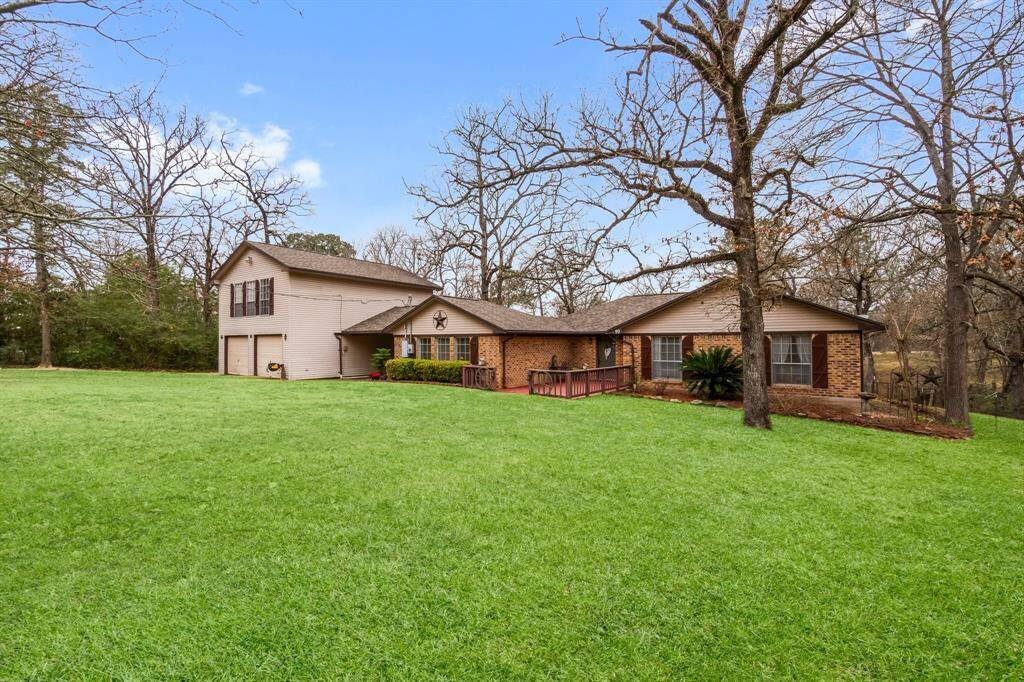 Ready to make some new memories!Original custom brick home was built in 1984 and the Atrium/Carport, oversized two car garage and guest quarters were added in 1999.