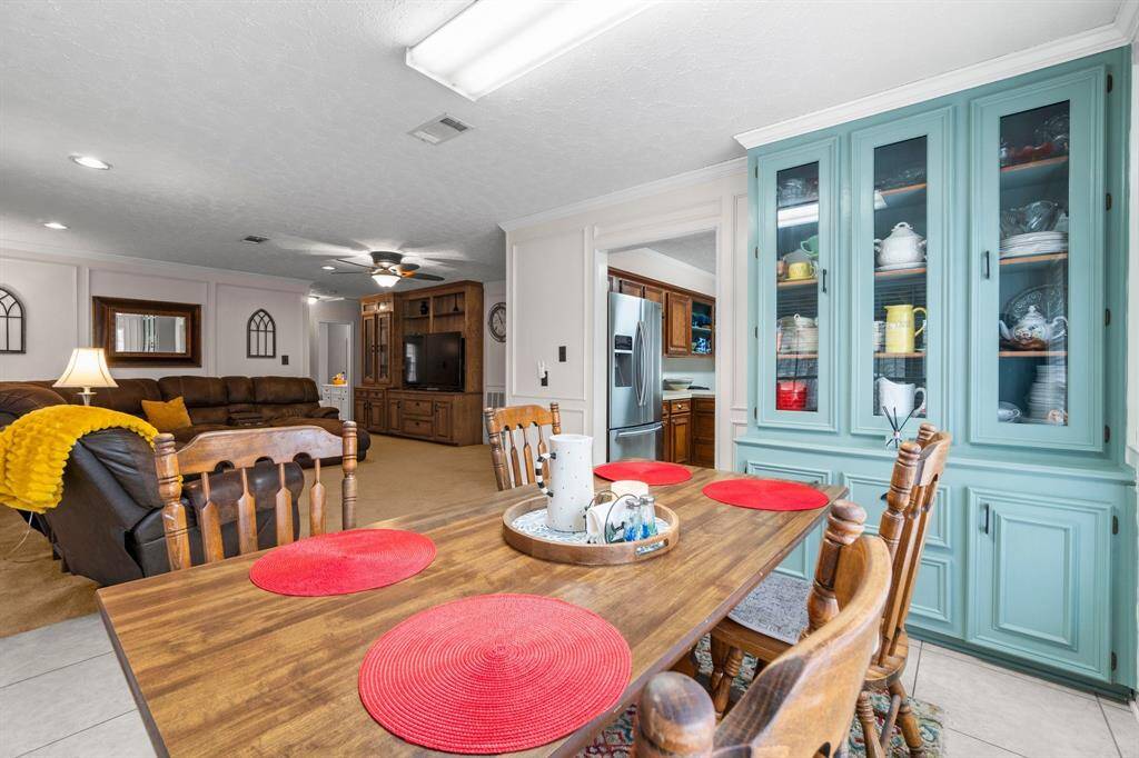 Open living and dining room that flows into the kitchen.