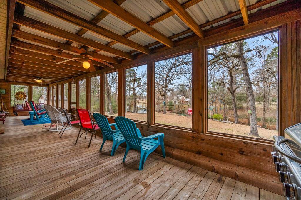 Check out this wonderful covered back porch that extends across the back of the home and leads to the backyard down to the water.   Step out the back and jump in your boat in less than a minute.