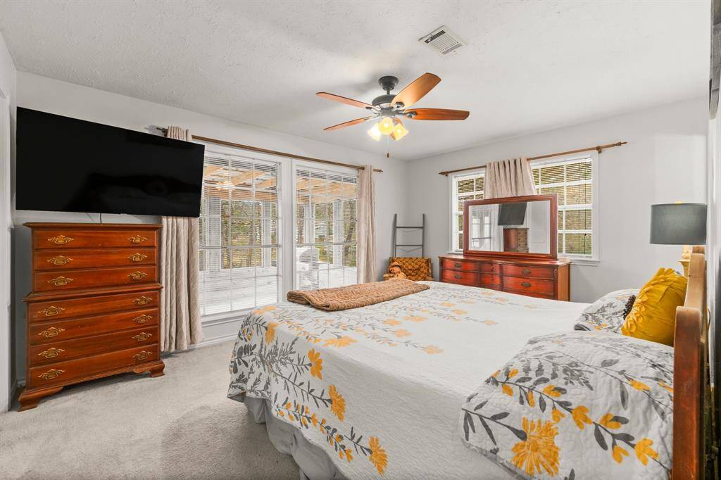 Bedrooms are spacious and have natural light.
