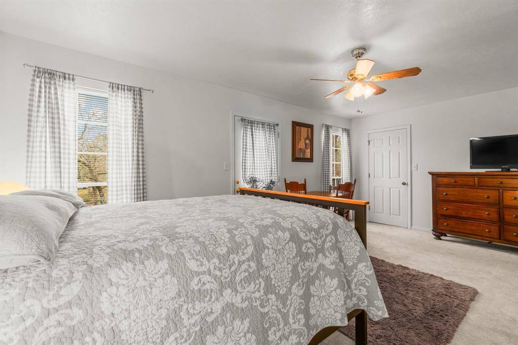 Light and bright guest quarters or 4th bedroom.  Furniture in the room conveys, excluding closet items.
