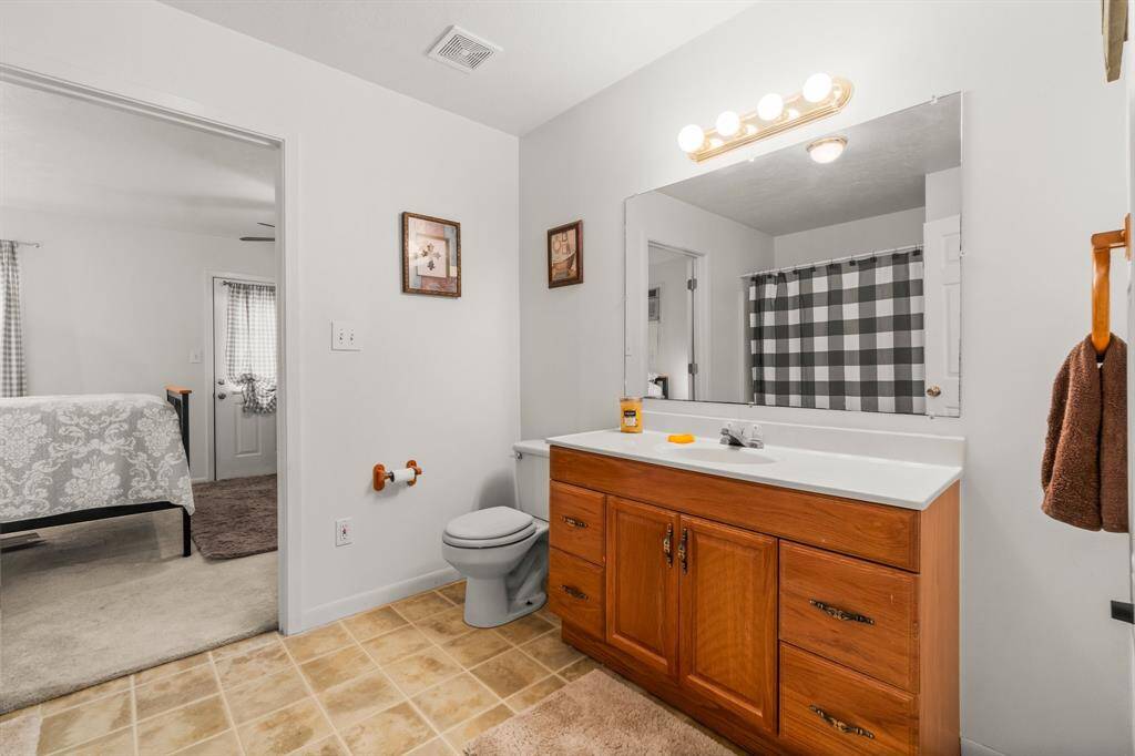 Nice sized vanity in the guess quarters bathroom.