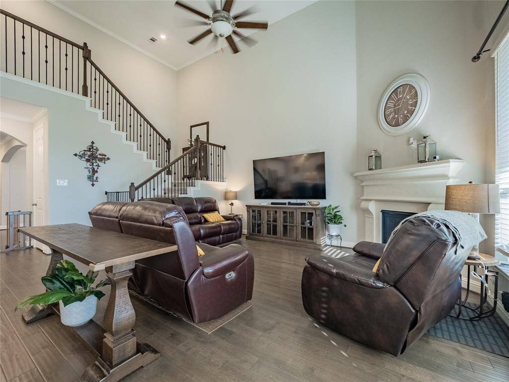you can see the family room from the entrance hallway soon as you walk in the family room is on the back side of the home overlooking the oversized lot