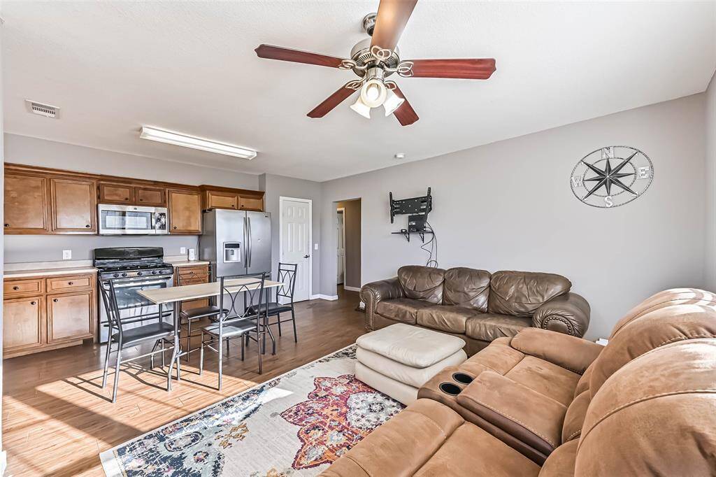 Open concept living/dining/kitchen.