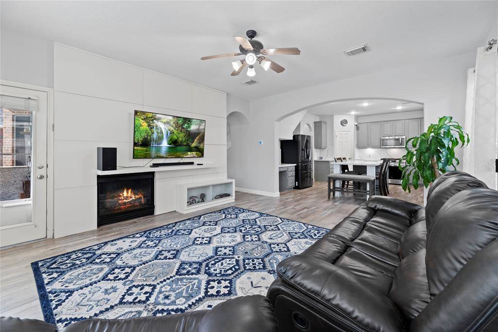 Open concept layout with kitchen and family room