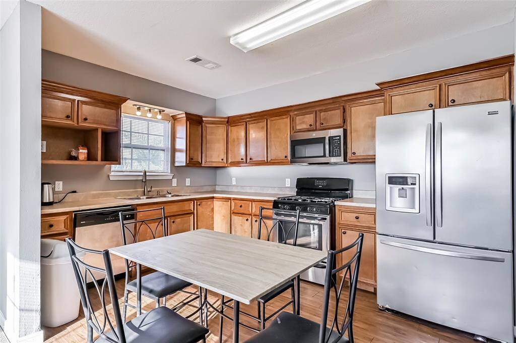 Kitchen with stainless steel appliances.