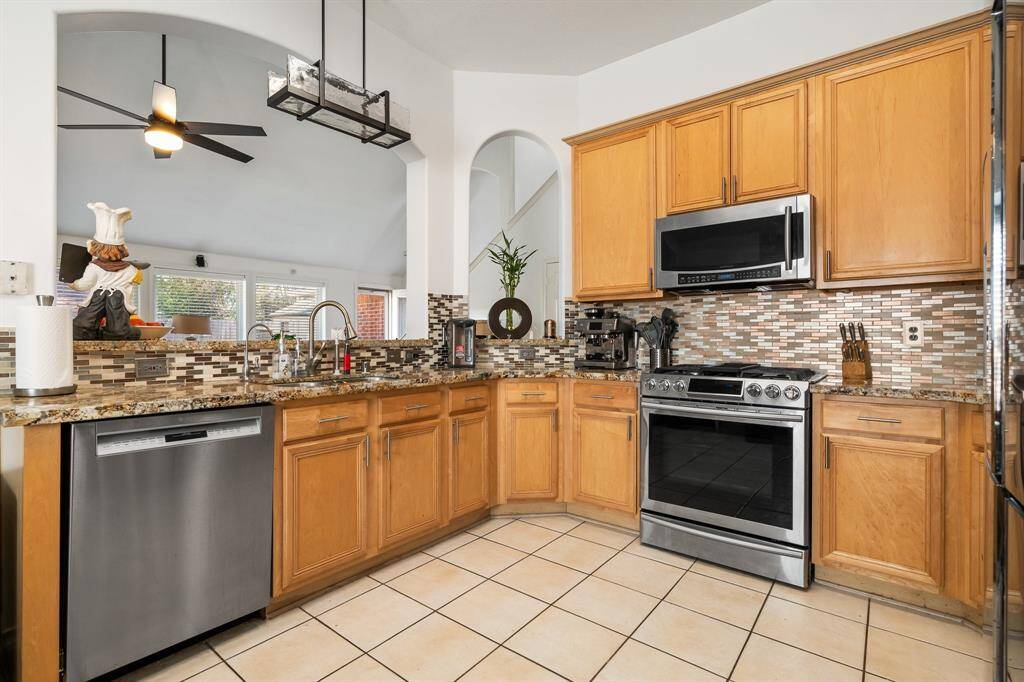 open kitchen area with breakfast bar