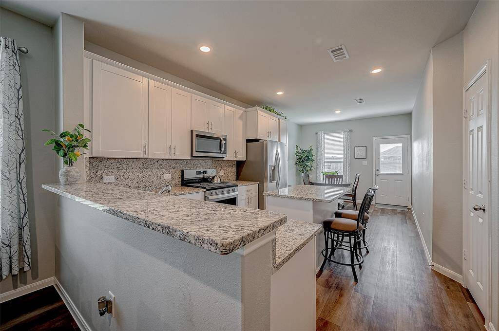 The kitchen jut off the living room.