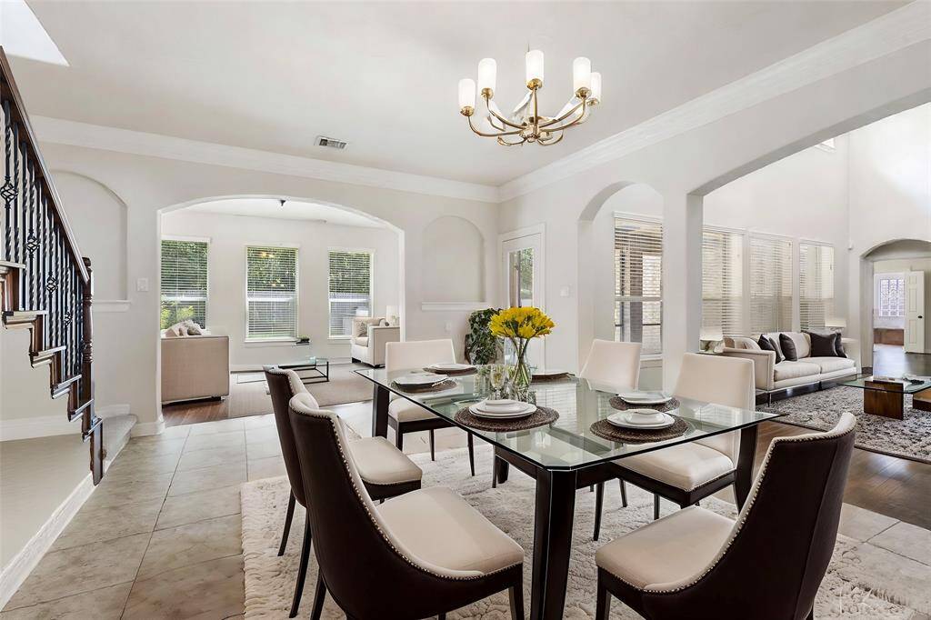 The spacious breakfast area is large enough for a full size table and chairs and the perfect place for a quick meal. This photo has been virtually staged.