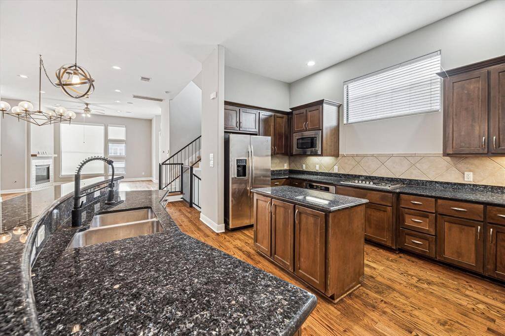 Abundant natural light in this spacious, modern kitchen, perfect for culinary adventures and entertaining.