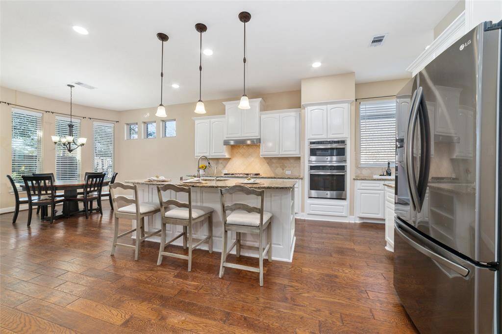 Gorgeous wood cabinetry and stainless steel appliances