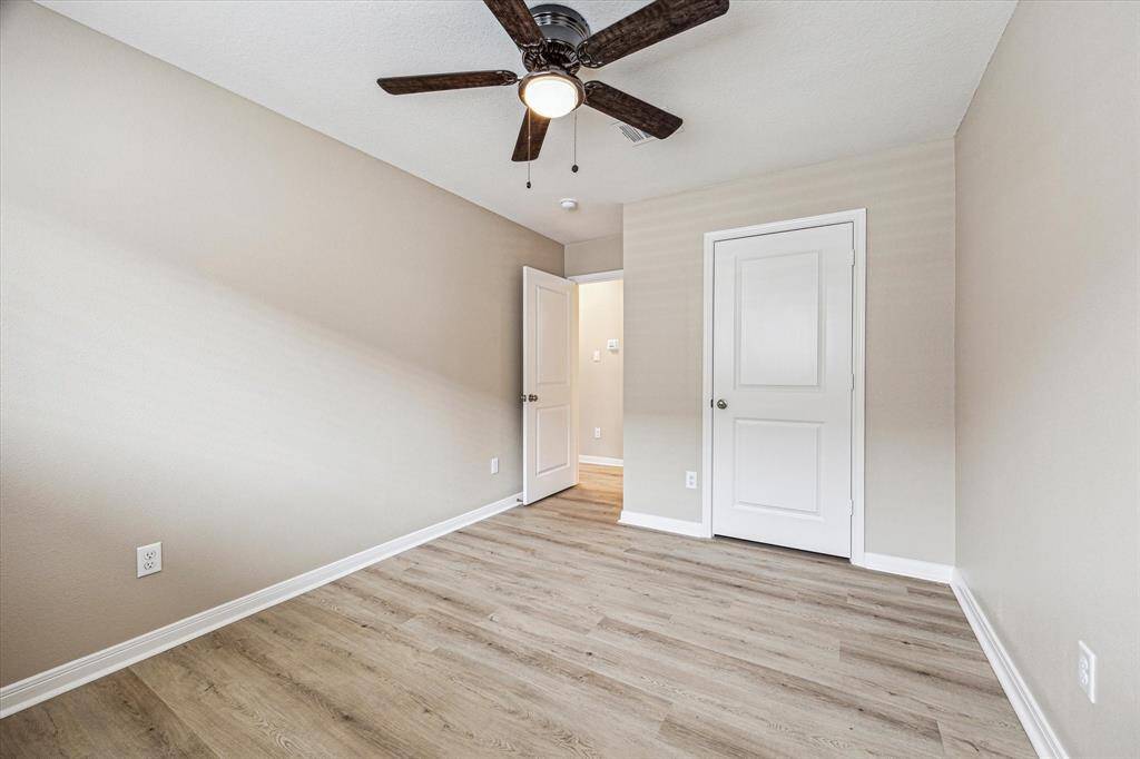 The first secondary bed room is across the hall from the hall bath room