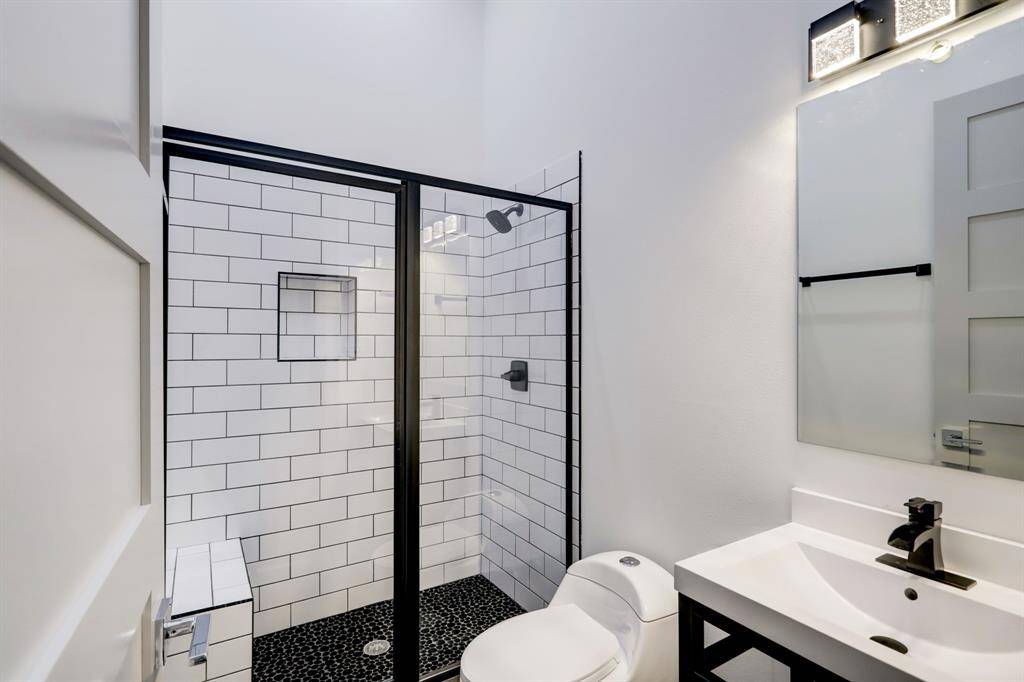 (1) of (3) secondary ensuite full bathrooms.