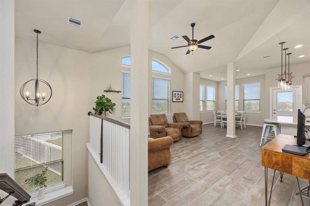 Another view of the main living area and staircase.