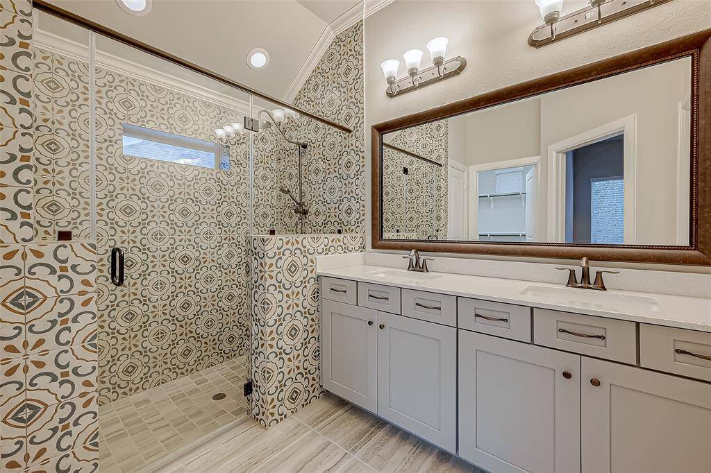 Double vanity, huge walk in shower.