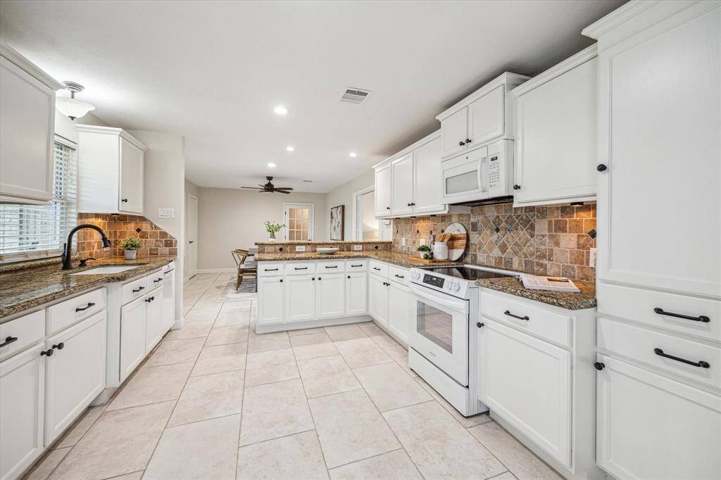 Ditch the takeout and cook from home more often. This beautifully equipped kitchen has a ton of countertop space for easy meal prep and clean up. With ample cabinetry and a large pantry, you’ll have plenty of room for all your favorite kitchen gadgets here.