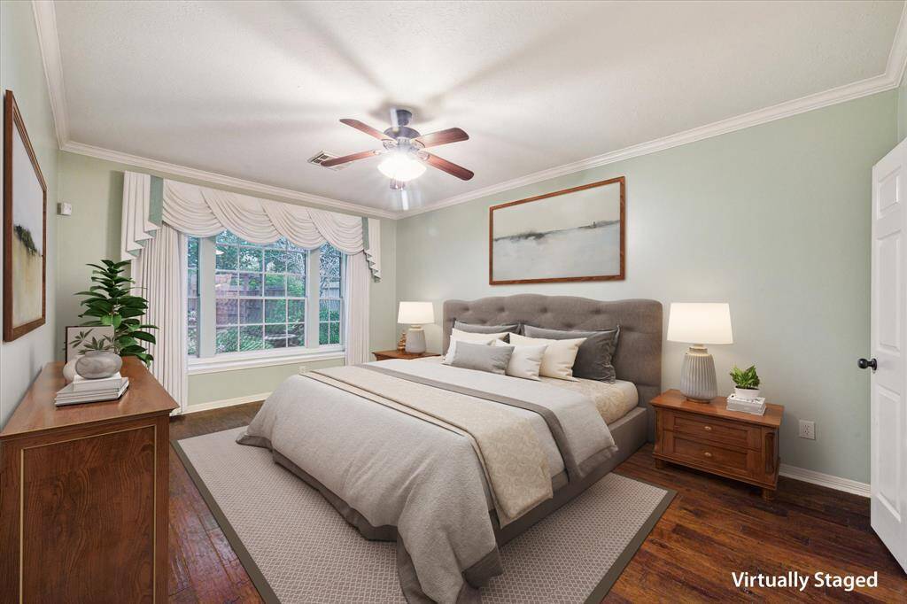 Large primary bedroom situated in the back of the home for additional privacy.