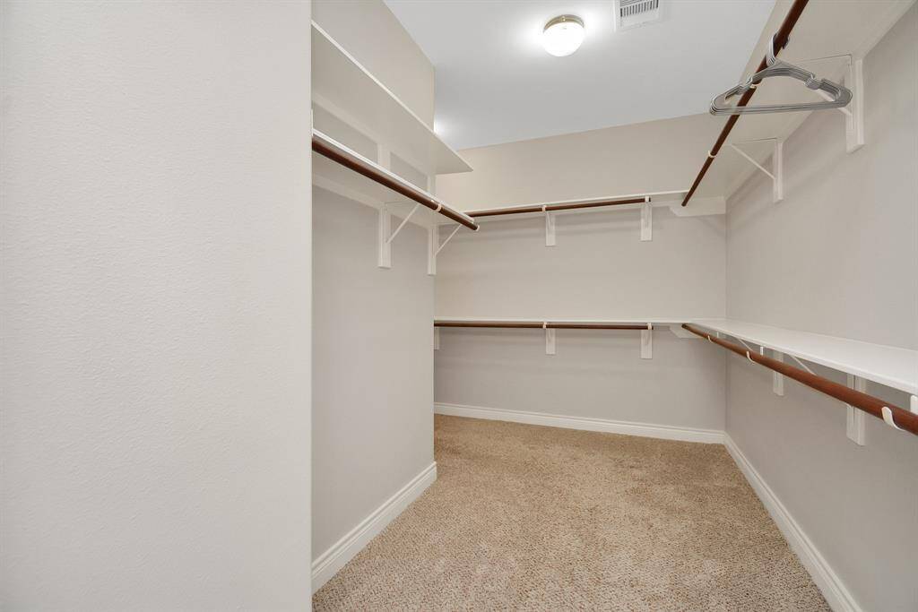 huge huge walk in closet to accomodate modern need for storage