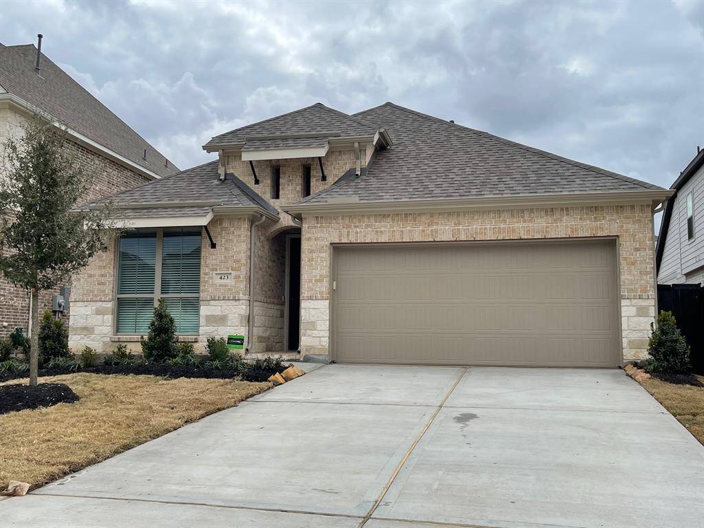 Single story home with attached garage
