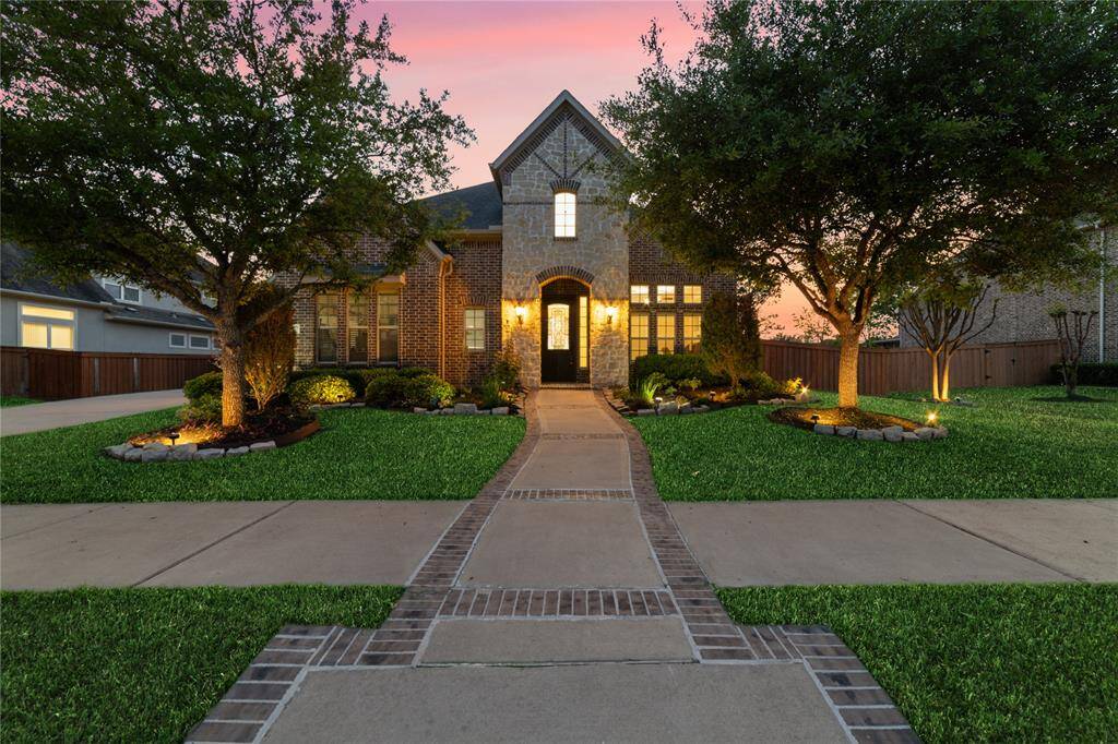 Evening view of the front of the home