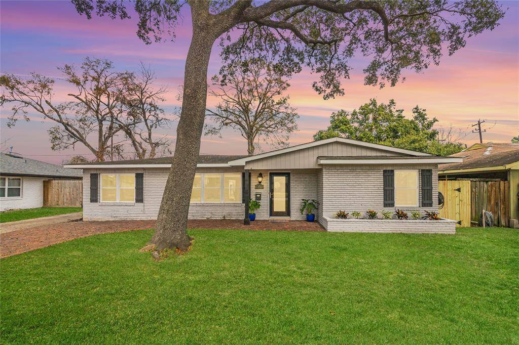 You are invited to come see this stunning updated Spring Branch home for yourself. You'll find amazing open floor plan with a fresh neutral color palette, hardwood floors, unique glass pocket doors, chic lighting, covered patio and so much more.
