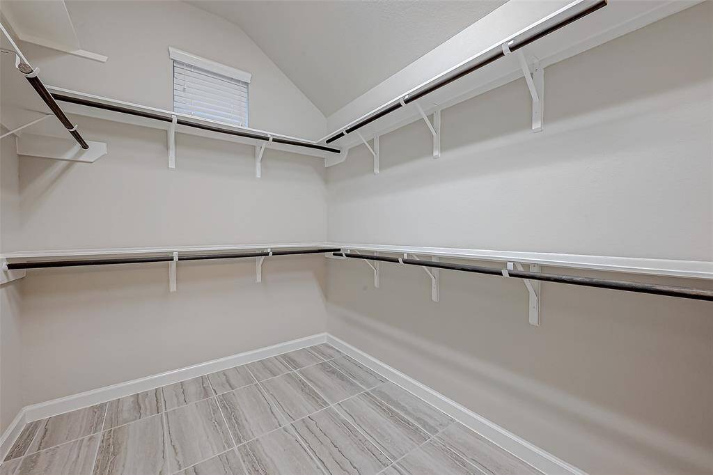 Great size primary closet.