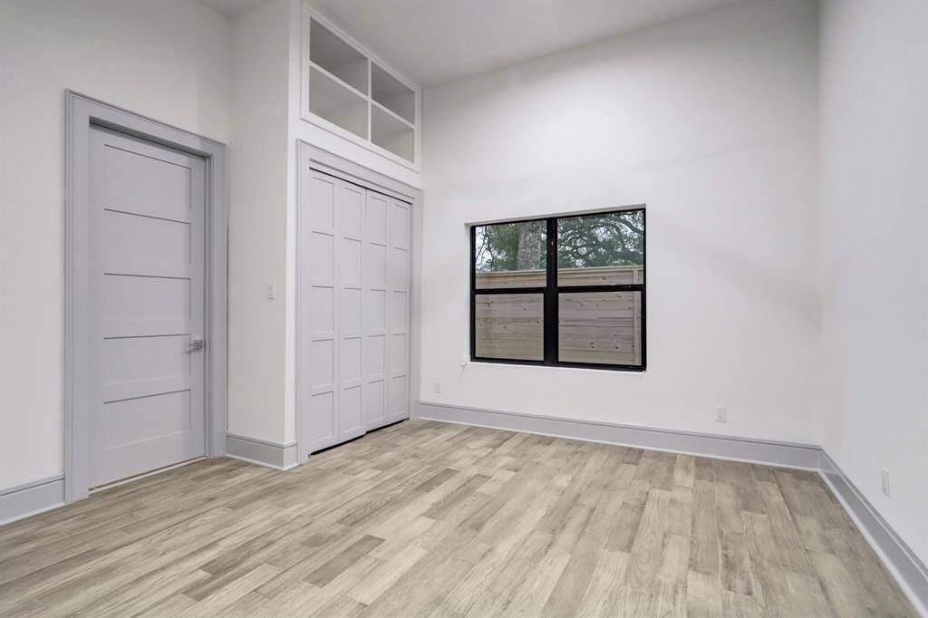 (1) of (3) secondary bedroms.