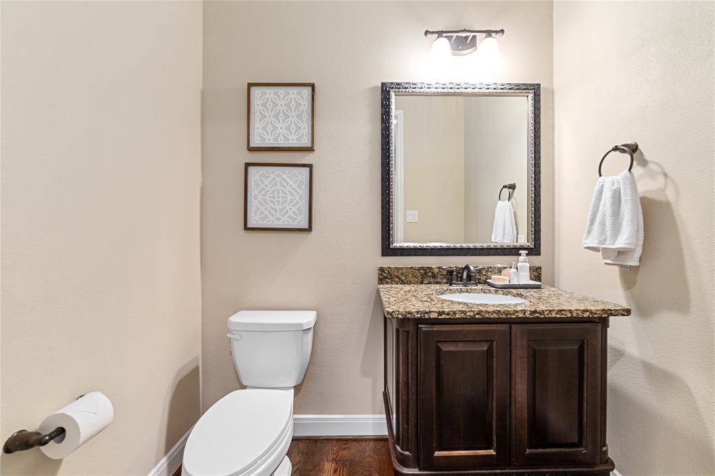 Spacious half bathroom with upgraded vanity
