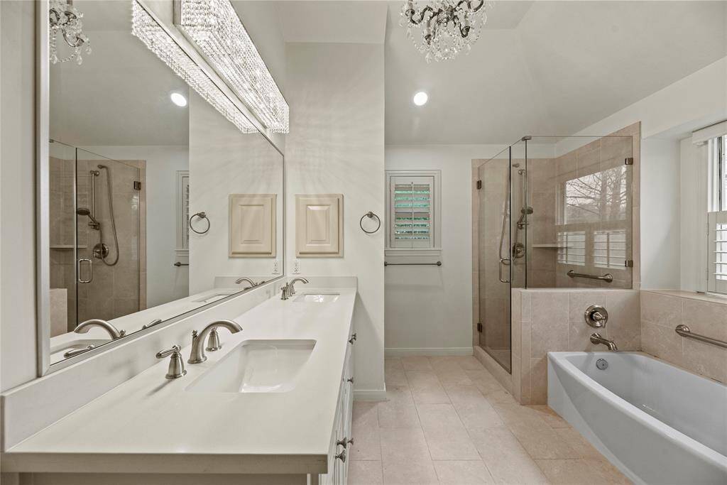 Primary bath with soaking tub and stand-alone shower