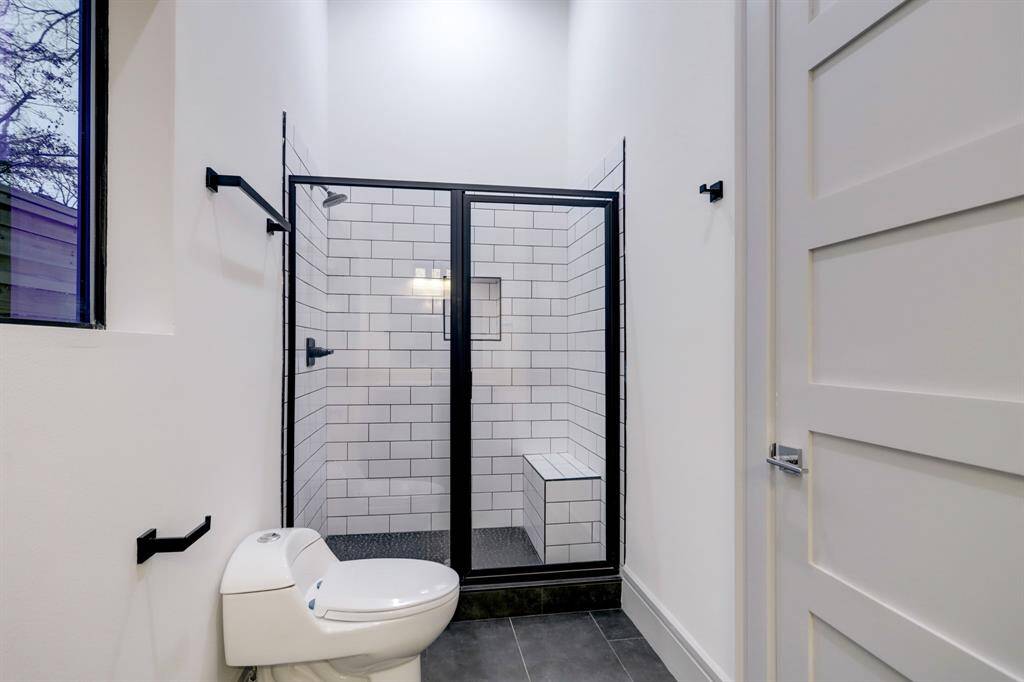 (1) of (3) secondary ensuite full bathrooms.