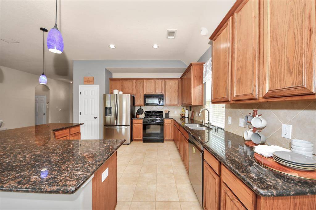 Kitchen with granite counters