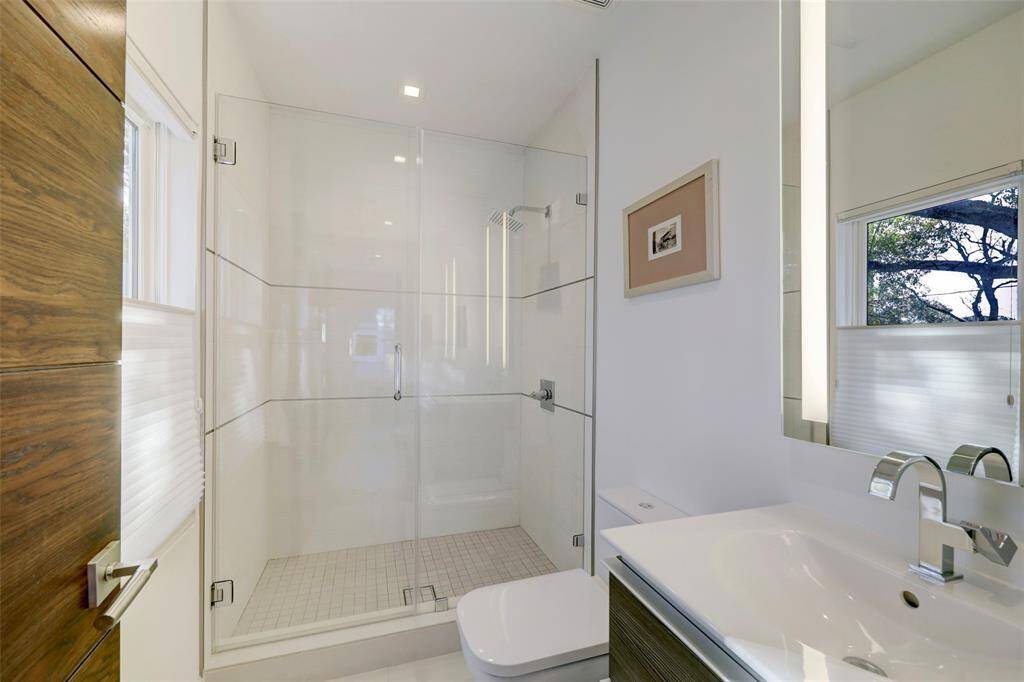 Timeless materials were used thoughout.  This elegant ensuite Bathroom feels like it could have been built in 2025 instead of 2015.
