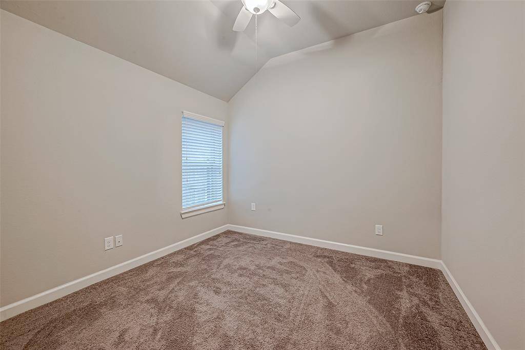 One of the two secondary bedrooms.