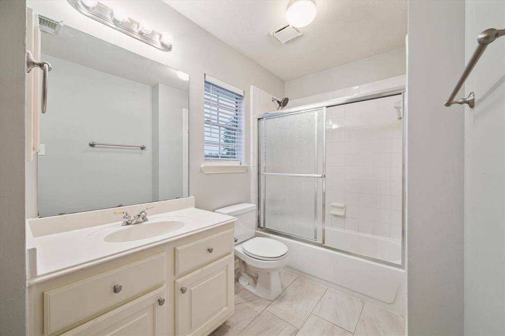 One of two full bathrooms upstairs.