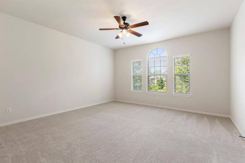 One of four enormous secondary bedrooms upstairs.